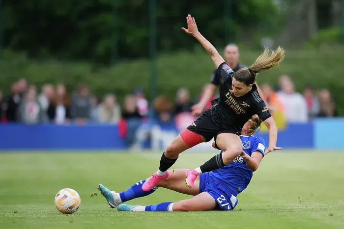 Framed Print : Queiroz Tackled by Stenevik: Everton vs. Arsenal Women's Super League Clash