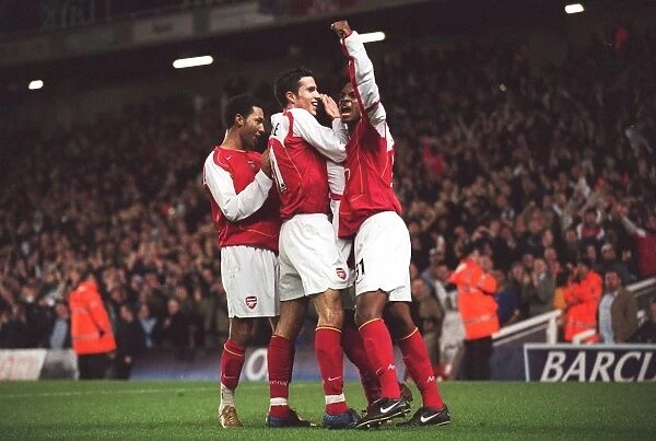 Quincy Owusu-Abeyie is congratulated on scoring the 1st Arsenal Goal by Jermaine Pennant