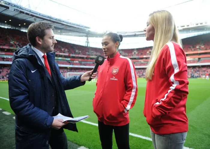 Framed Print : Rachel Yankey and Anouk Hoogendijk of the Arsenal Ladies are interviewed before the match