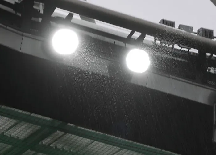 Framed Print : Rainy Premier League Showdown: Arsenal vs Nottingham Forest at Emirates Stadium