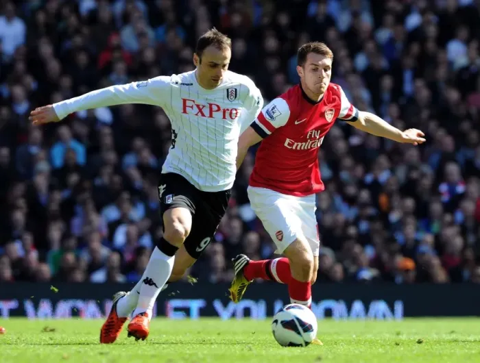 Framed Print : Ramsey Closes In: Intense Battle Between Aaron Ramsey and Dimitar Berbatov in Fulham vs Arsenal Premier League Clash Framed Print : Ramsey Closes In: Intense Battle Between Aaron Ramsey and Dimitar Berbatov in Fulham vs Arsenal Premier League Clash