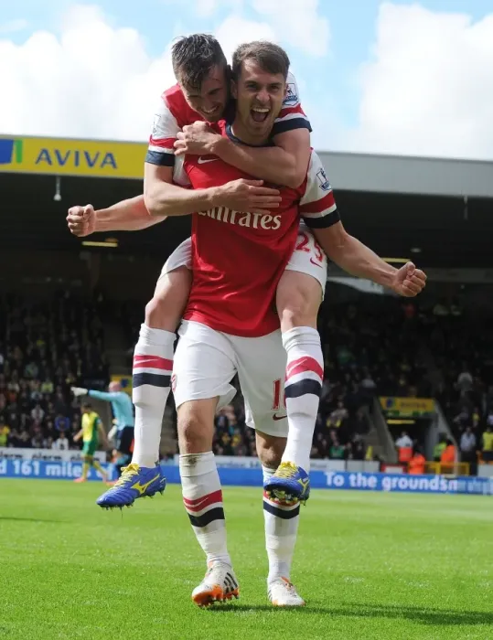 Framed Print : Ramsey and Jenkinson Celebrate Arsenal's Goal Against Norwich City (2013-14) Framed Print : Ramsey and Jenkinson Celebrate Arsenal's Goal Against Norwich City (2013-14)