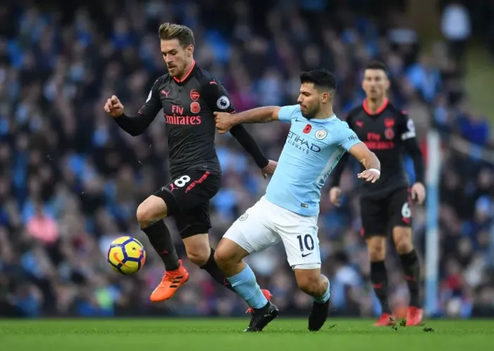 Framed Print : Ramsey Outmaneuvers Aguero: Manchester City vs. Arsenal, Premier League Showdown (2017-18) Framed Print : Ramsey Outmaneuvers Aguero: Manchester City vs. Arsenal, Premier League Showdown (2017-18)