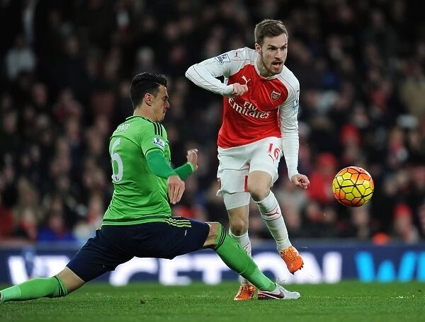 Ramsey Outmaneuvers Fonte: Arsenal's Midfield Maestro Shines in Premier League Showdown
