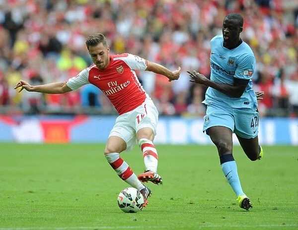 Ramsey Outmaneuvers Toure: Arsenal's FA Community Shield Triumph over Manchester City