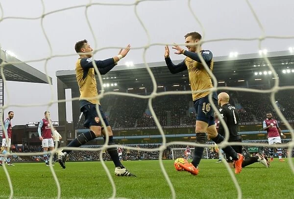 Ramsey and Ozil's Jubilant Moment: Arsenal's Victory over Aston Villa, Premier League 2015-16