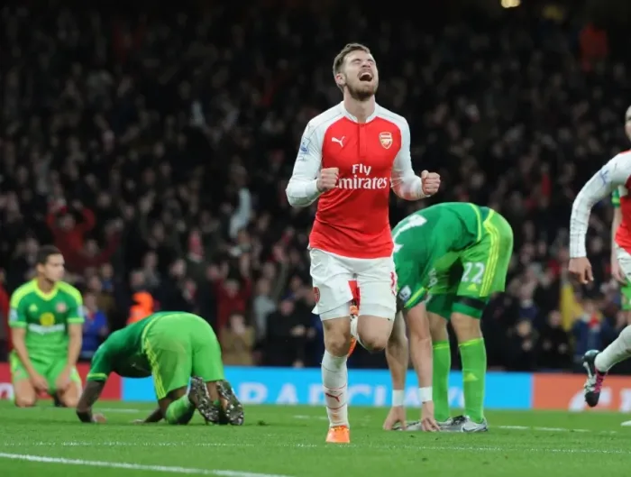Framed Print : Ramsey Scores Hat-trick: Arsenal Dominates Sunderland in Premier League Showdown
