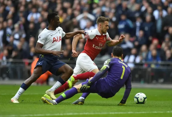 Framed Print : Ramsey Stuns Spurs: Dramatic Goal Against Wanyama and Lloris in Arsenal's Victory