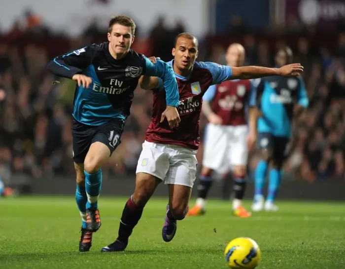 Framed Print : Ramsey vs. Agbonlahor: A Premier League Battle at Villa Park Framed Print : Ramsey vs. Agbonlahor: A Premier League Battle at Villa Park