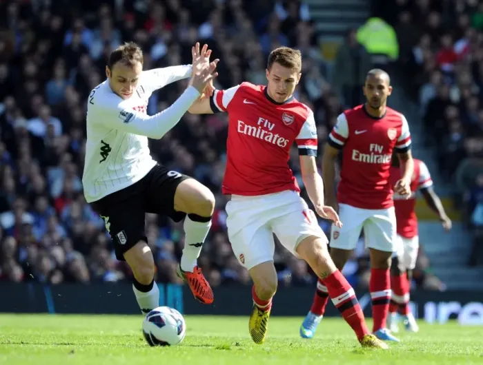 Framed Print : Ramsey vs. Berbatov: Intense Battle in Fulham vs. Arsenal Premier League Clash