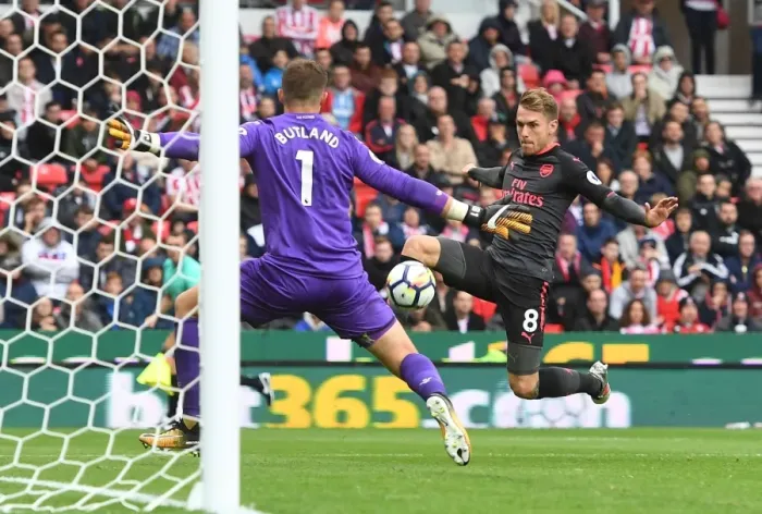 Framed Print : Ramsey vs. Butland: Premier League Showdown at Stoke City Framed Print : Ramsey vs. Butland: Premier League Showdown at Stoke City