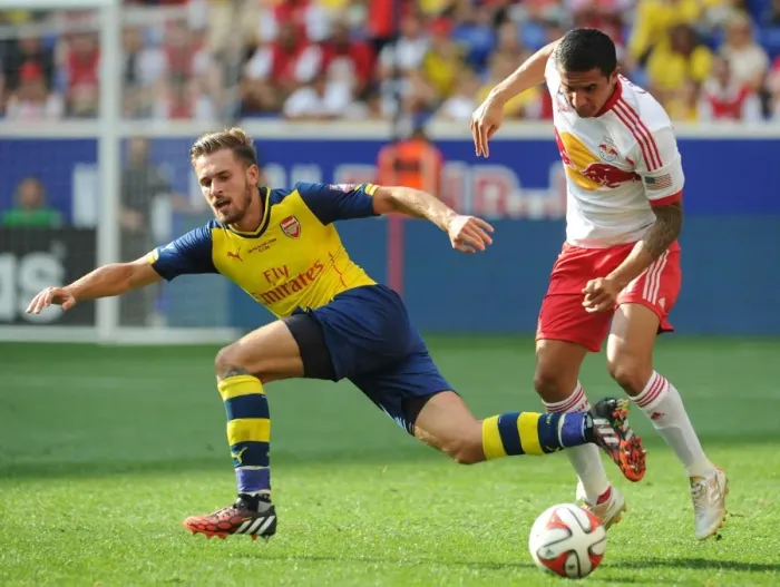 Framed Print : Ramsey vs. Cahill: Clash of the Titans - Arsenal vs. New York Red Bulls Pre-Season