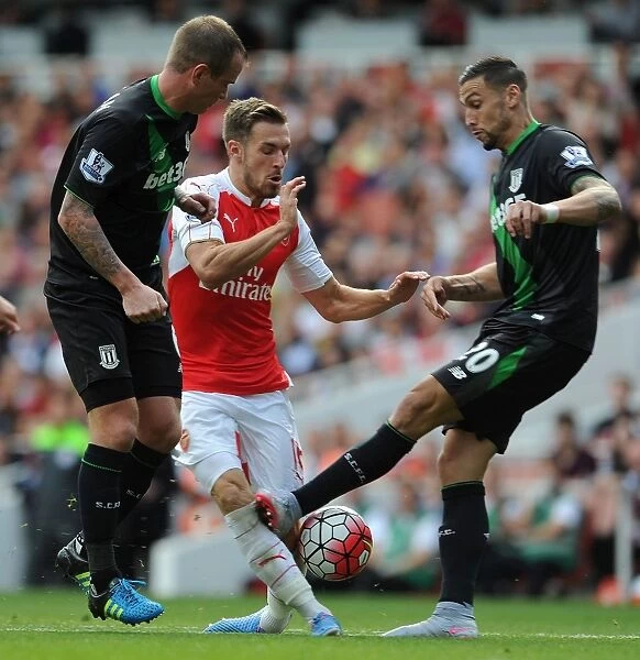 Ramsey vs. Cameron: Intense Face-Off in Arsenal's Clash Against Stoke City