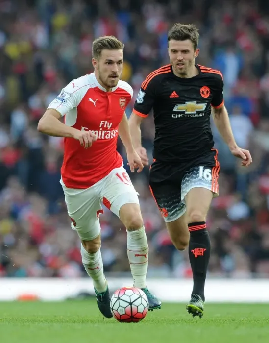 Framed Print : Ramsey vs Carrick: A Footballing Battle in Arsenal vs Manchester United