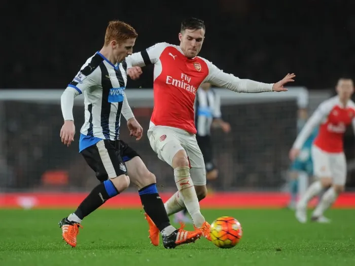 Framed Print : Ramsey vs. Colback: A Footballing Battle at Emirates Stadium Framed Print : Ramsey vs. Colback: A Footballing Battle at Emirates Stadium