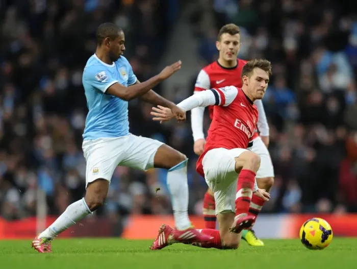 Framed Print : Ramsey vs Fernandinho: Intense Battle in Manchester City vs Arsenal (2013-14)