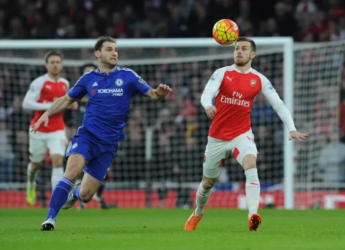Framed Print : Ramsey vs Ivanovic: Chelsea's Narrow Victory Over Arsenal in Intense Premier League Clash