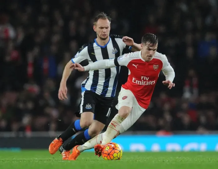 Framed Print : Ramsey vs. De Jong: Clash of the Midfielders in Arsenal vs. Newcastle Premier League Showdown Framed Print : Ramsey vs. De Jong: Clash of the Midfielders in Arsenal vs. Newcastle Premier League Showdown