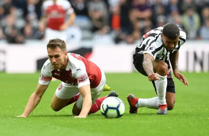 Framed Print : Ramsey vs. Kenedy: A Premier League Showdown at St. James Park Framed Print : Ramsey vs. Kenedy: A Premier League Showdown at St. James Park