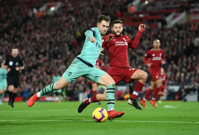 Framed Print : Ramsey vs Lallana: Intense Battle at Anfield - Liverpool vs Arsenal, Premier League 2018-19
