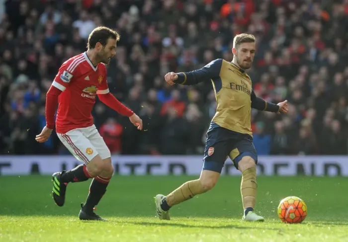 Framed Print : Ramsey vs Mata: Intense Rivalry in the Premier League Clash between Manchester United and Arsenal, 2015 / 16 Framed Print : Ramsey vs Mata: Intense Rivalry in the Premier League Clash between Manchester United and Arsenal, 2015 / 16
