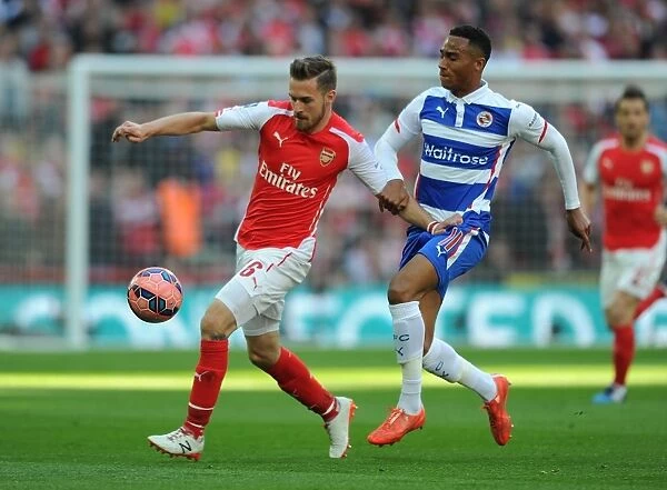Ramsey vs. Obita: Intense Showdown at the FA Cup Semi-Final - Arsenal vs. Reading, Wembley Stadium, London, 2015