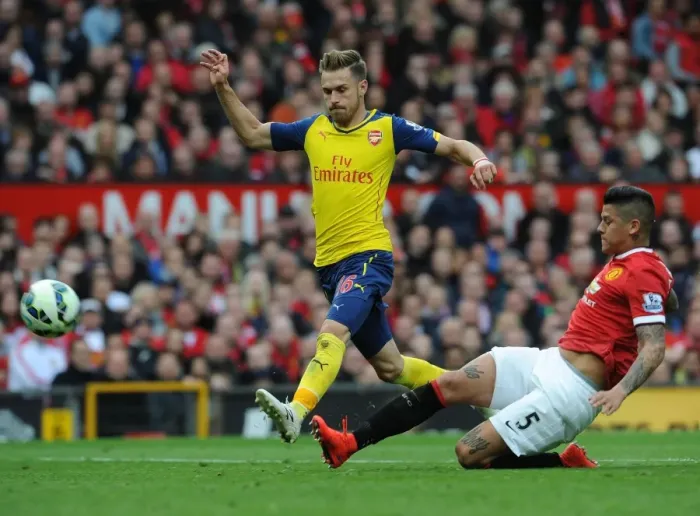 Framed Print : Ramsey vs. Rojo: A Premier League Battle at Old Trafford Framed Print : Ramsey vs. Rojo: A Premier League Battle at Old Trafford