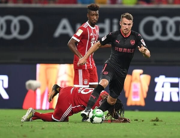 Ramsey vs Sanches: A Football Battle - Arsenal vs Bayern Munich Pre-Season Clash in Shanghai