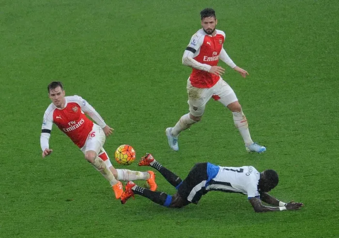 Framed Print : Ramsey vs Sissoko: A Premier League Showdown - Arsenal's Battle with Newcastle's Midfielders Framed Print : Ramsey vs Sissoko: A Premier League Showdown - Arsenal's Battle with Newcastle's Midfielders
