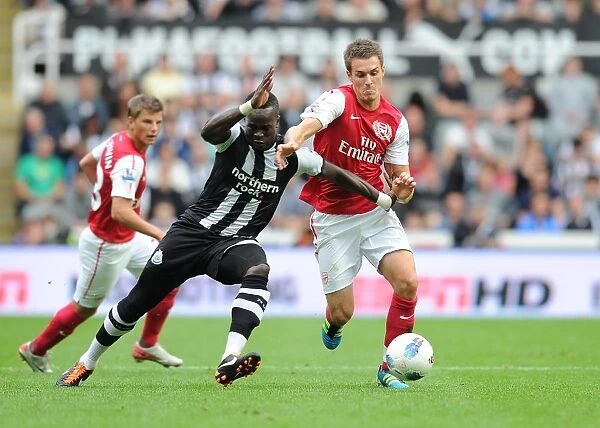 Ramsey vs. Tiote: Intense Battle in Newcastle United vs. Arsenal (2011-12)