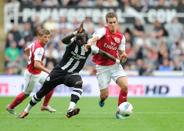 Framed Print : Ramsey vs. Tiote: Intense Battle in Newcastle United vs. Arsenal (2011-12)