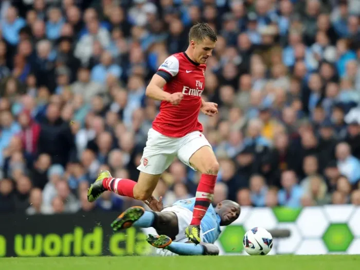 Framed Print : Ramsey vs Toure: A Riveting Rivalry in Manchester City vs Arsenal's Premier League Draw (2012)