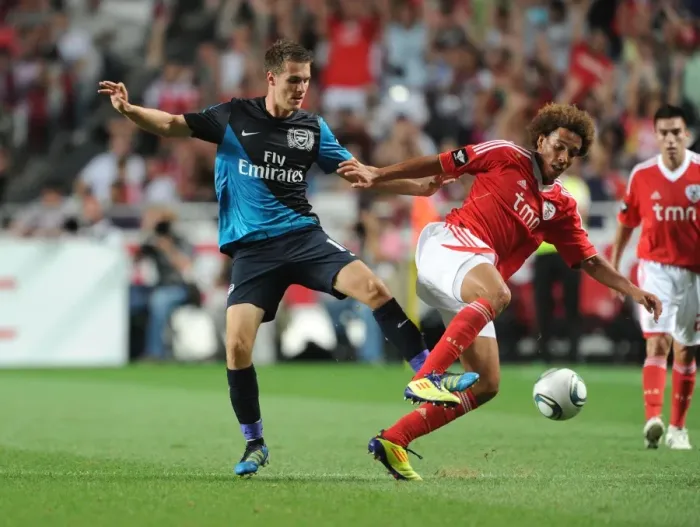 Framed Print : Ramsey vs. Witsel: Battle in the Pre-Season Friendly between Benfica and Arsenal (2011)
