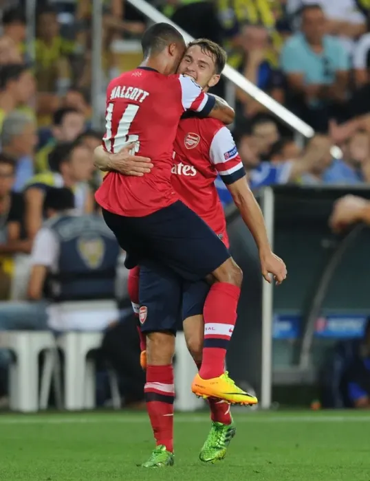 Framed Print : Ramsey and Walcott Celebrate Arsenal's Third Goal vs. Fenerbahce in 2013 Champions League Play-offs