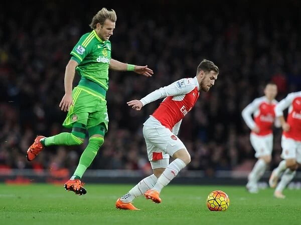 Ramsey's Agile Moves: Outmaneuvering Toivonen in Arsenal's Premier League Victory