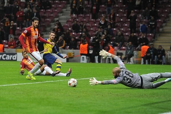 Ramsey's Decisive Strike: Arsenal's Champions League Triumph over Galatasaray (Aaron Ramsey Scores Past Sinan Bolat)