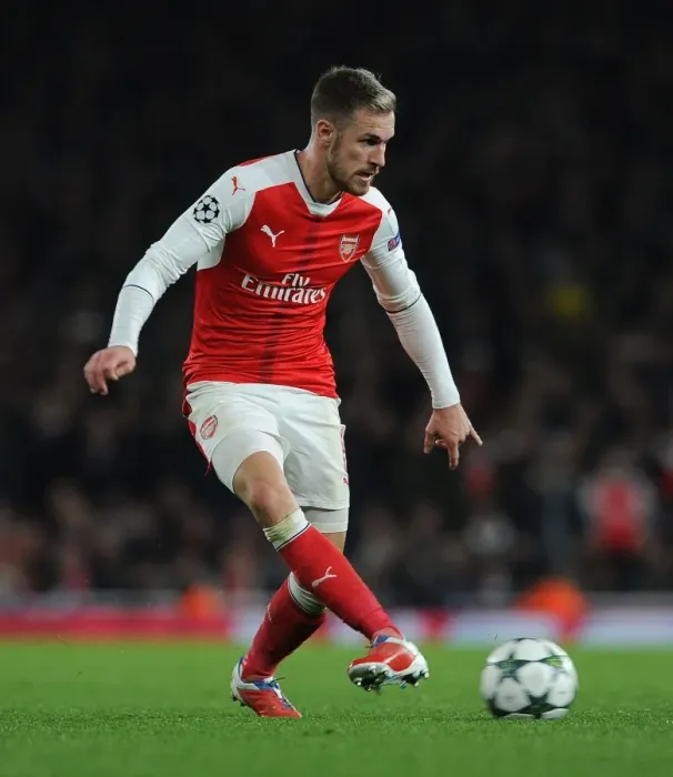 Framed Print : Ramsey's Midfield Battle: Arsenal vs. Paris Saint-Germain in Champions League Showdown Framed Print : Ramsey's Midfield Battle: Arsenal vs. Paris Saint-Germain in Champions League Showdown