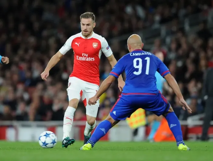 Framed Print : Ramsey's Slick Moves: Outmaneuvering Cambiasso in Arsenal's 2015 Champions League Battle Framed Print : Ramsey's Slick Moves: Outmaneuvering Cambiasso in Arsenal's 2015 Champions League Battle