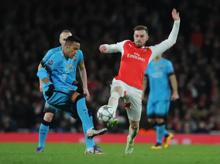 Framed Print : Ramsey's Tenacious Tackle: Arsenal vs. Barcelona - Champions League Showdown Framed Print : Ramsey's Tenacious Tackle: Arsenal vs. Barcelona - Champions League Showdown