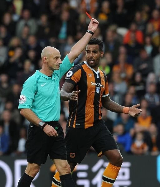 Red Card Drama: Huddlestone Dismissed as Arsenal Secure Premier League Victory Over Hull