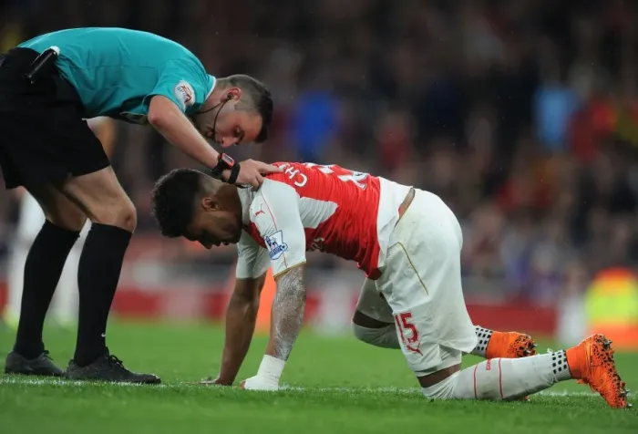 Framed Print : Referee Examines Oxlade-Chamberlain Amid Intense Arsenal vs. Liverpool Clash (2015 / 16)