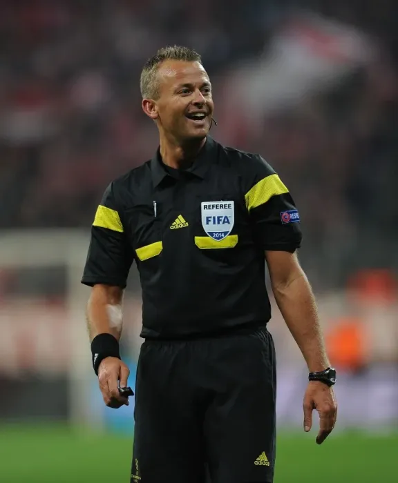 Framed Print : Referee Svein Oddvar Moen Overssees Tense Bayern Munich vs. Arsenal UEFA Champions League Clash