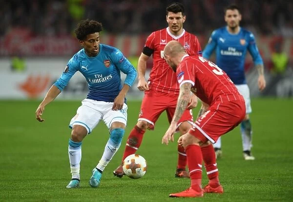 Reiss Nelson in Action: Arsenal's Young Star Shines in UEFA Europa League Match against 1. FC Koeln (2017-18)