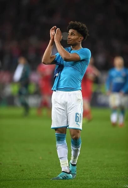 Reiss Nelson Celebrates with Arsenal Fans after UEFA Europa League Victory over 1. FC Koeln
