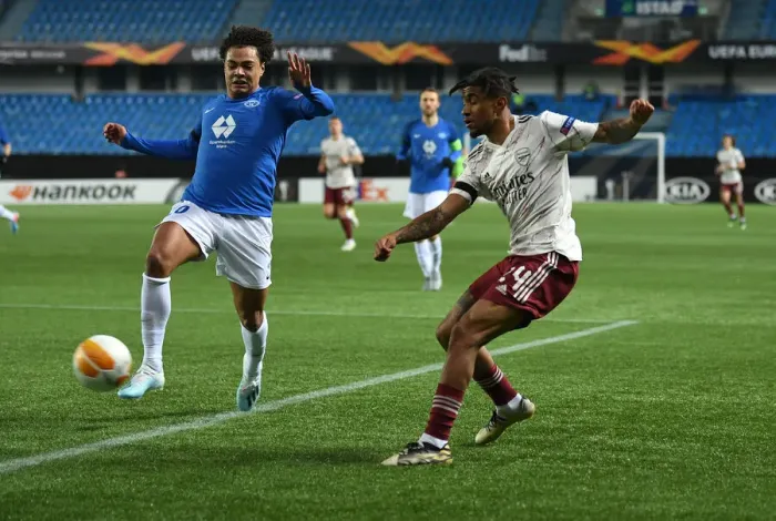 Framed Print : Reiss Nelson Faces Off Against Henry Wingo: Molde FK vs. Arsenal FC - UEFA Europa League (Group B) Framed Print : Reiss Nelson Faces Off Against Henry Wingo: Molde FK vs. Arsenal FC - UEFA Europa League (Group B)