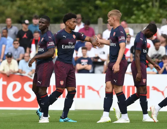 Framed Print : Reiss Nelson, Jordi Osei-Tutu, and Emile Smith Rowe: Celebrating Goals in Arsenal's Pre-Season Victory over Borehamwood