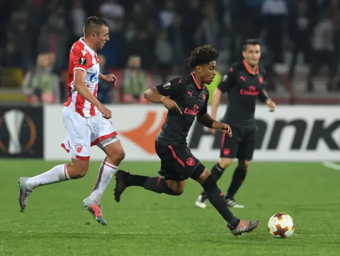 Framed Print : Reiss Nelson Outsmarts Nenad Krsticic: A Europa League Battle at Rajko Mitic Stadium Framed Print : Reiss Nelson Outsmarts Nenad Krsticic: A Europa League Battle at Rajko Mitic Stadium