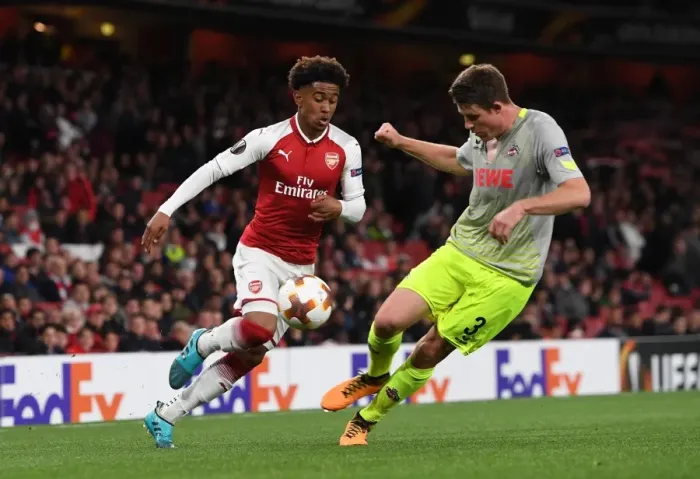 Framed Print : Reiss Nelson vs. Dominique Heintz: Clash in the Europa League between Arsenal and 1. FC Koeln Framed Print : Reiss Nelson vs. Dominique Heintz: Clash in the Europa League between Arsenal and 1. FC Koeln