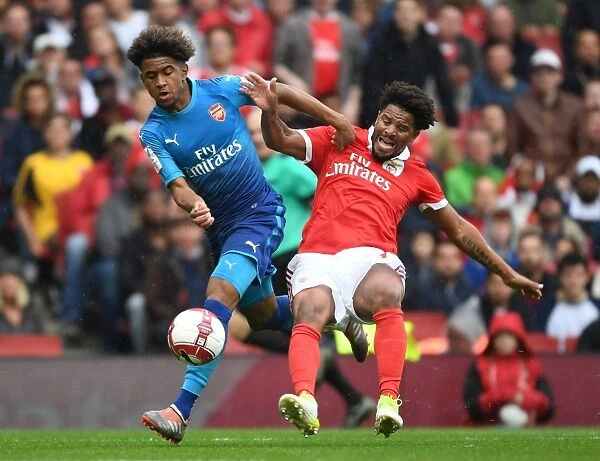 Reiss Nelson vs Eliseu: A Battle for Control at the Emirates Cup