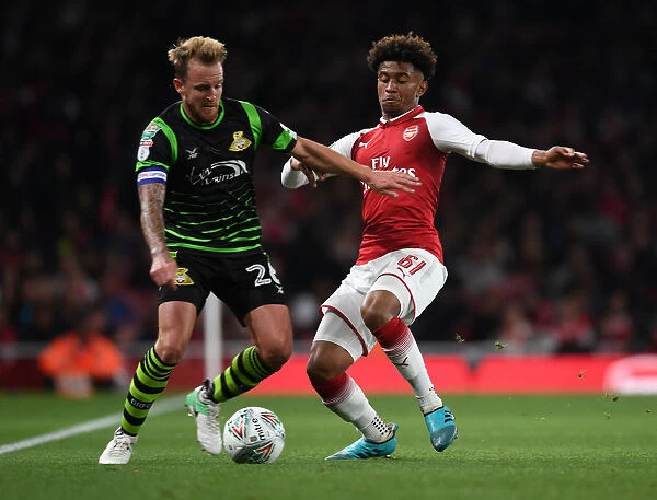 Reiss Nelson vs. James Coppinger: Arsenal vs. Doncaster Rovers in Carabao Cup Clash